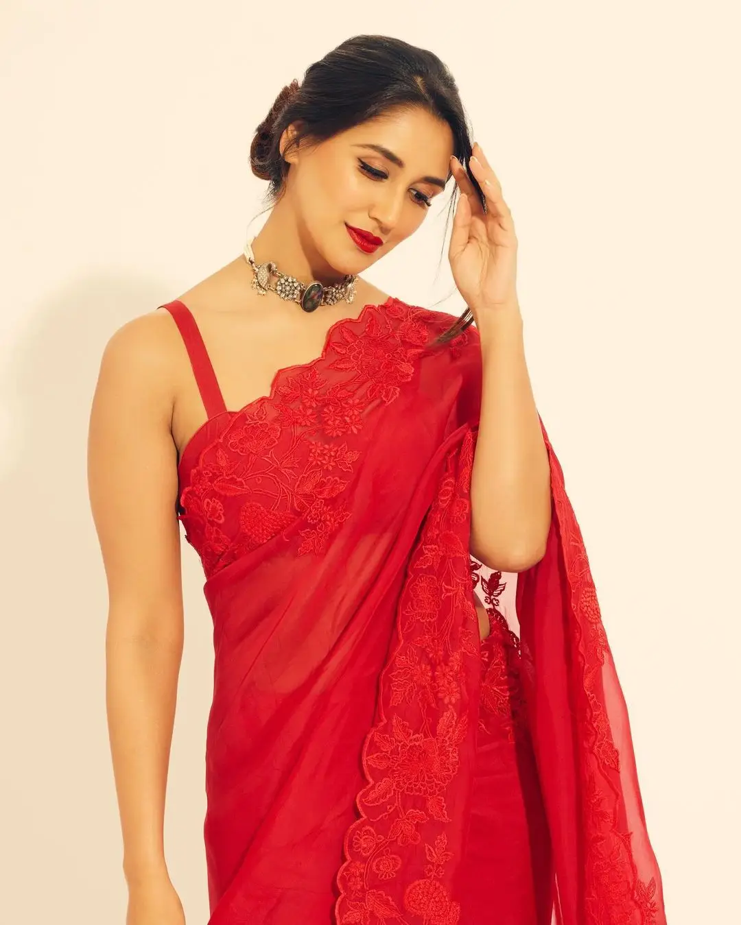 Marathi Actress Nikita Dutta in Red Saree Sleeveless Blouse